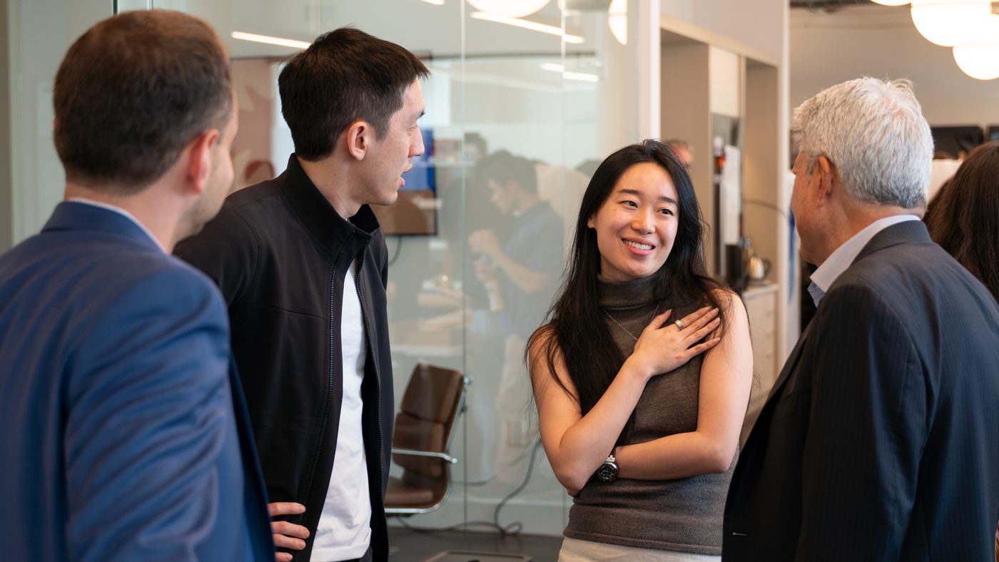 Valon teammates talking together in the office