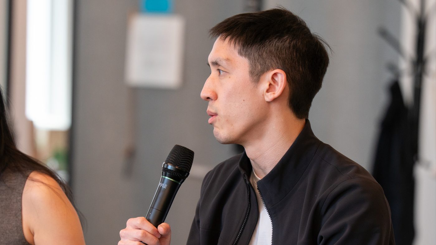 A Valon teammate answering a question at a company event